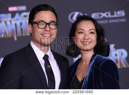 LOS ANGELES - JAN 29:  Randall Park and Jae Suh Park arrives for the 'Black Panther' World Premiere on January 29, 2018 in Hollywood, CA                