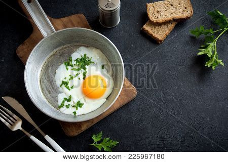 Fried Egg On Frying Pan For Breakfast