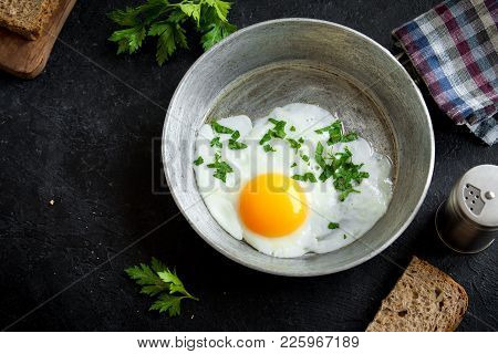 Fried Egg On Frying Pan For Breakfast