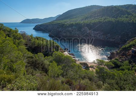 The Cove Will Be With Blue Water On The Island Of Ibiza