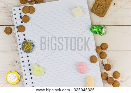 Notepad And Traditional Dutch Candy For Celebration Of Sinterklaas Holiday