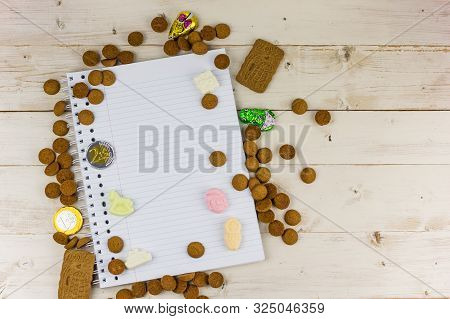 Notepad And Traditional Dutch Candy For Celebration Of Sinterklaas Holiday