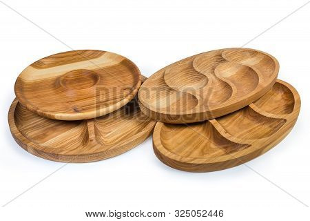 Different Empty Compartmental Dishes And Serving Boards Round And Oval Shapes Made With Hardwood On 