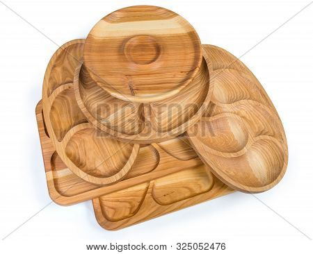 Different Empty Compartmental Dishes And Serving Boards Various Shapes Made With Hardwood On A White