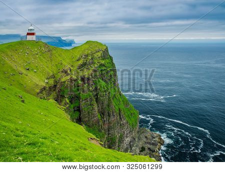 Shot Of Beautiful Scene, Kalsoy Island and Kallur lighthouse, Faroe Islands
