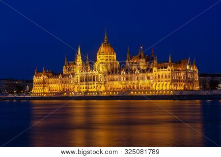 The Hungarian Parliament Building, A Notable Landmark Of Hungary In Budapest. View Of The Main Facad