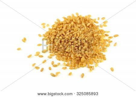 Close Up Heap Of Yellow Traditional Bulgur (bulghur, Burghul) Big Grains Of Durum Wheat, Isolated On