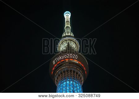 Tokyo, Japan - July 29, 2019: The Skytree Tower Is Illuminated At Night Announcing The Summer Olympi