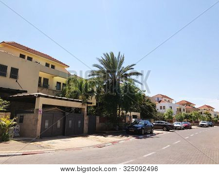 Holon, Israel  April 02, 2019: Private Houses, Trees And Streets In Holon, Israel.