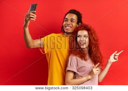Happy Lovely Mixed Race Couple Has Stroll Together, Stand Next To Each Other, Pose For Making Selfie