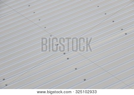 Close-up Of Metal Shiny White Striped Surface