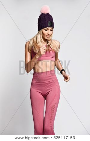 Beautiful Sexy Blonde Woman With Perfect Athletic Slim Figure By Physical Education Or Fitness, Lead