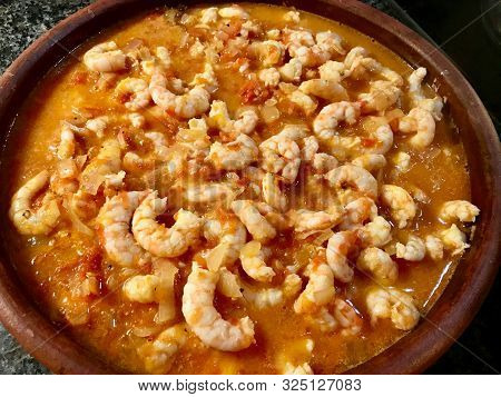 Homemade Shrimp Stew Casserole With Melted Cheese.