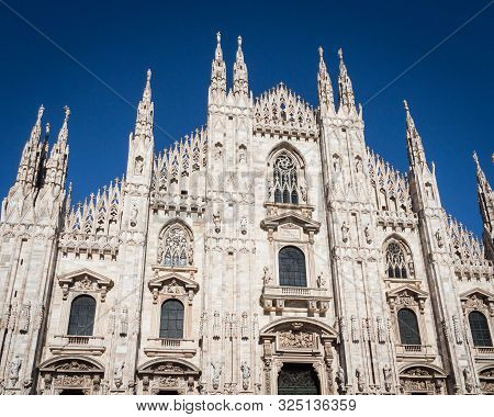 Ornate Facade Of Milan Catehdral In Italy