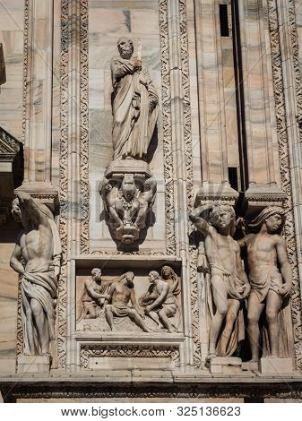 Ornate Facade Of Milan Catehdral In Italy