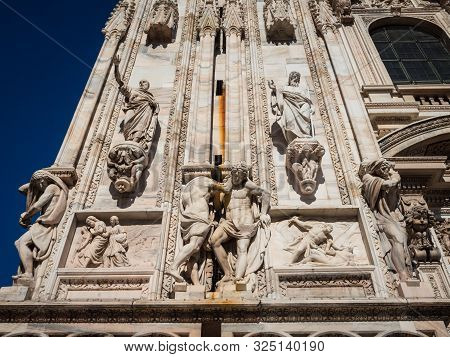 Ornate Facade Of Milan Catehdral In Italy