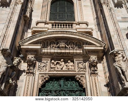 Ornate Facade Of Milan Catehdral In Italy