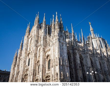 Ornate Facade Of Milan Catehdral In Italy