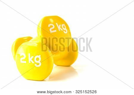 Yellow Dumbbell Weights Isolate On White Background
