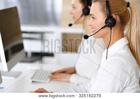 Call Center. Happy And Excited Business Woman Using Headset While Consulting Clients Online. Custome