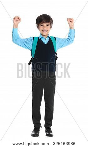 Happy Boy In School Uniform On White Background