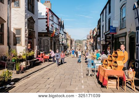High St, Conwy, Wales Uk- September, 13 2019 Beekeepers Sell Their Honey Produce To Tourists And Loc