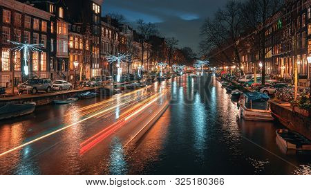 Amsterdam, Netherlands - January 14, 2019: Light Festival Amsterdam,  Wind Driven Propellers In Whit