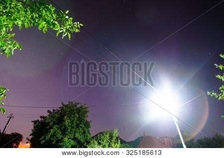 Bright Light Of A Lamppost At Night