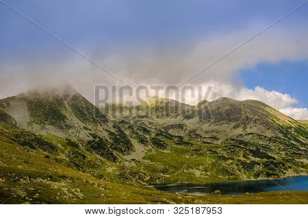 Mountain Landscape And Glacial Bucura Lake In Retezat National Park, Carpathian Mountains, Romania