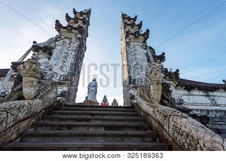 Unidentified Man At Temple Gate In Pura Penataran Agung Lempuyang Bali, Indonesia