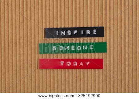 Concept Inspire Someone Today - Label Print With The Words - Inspire Someone Today - On Yellow Backg