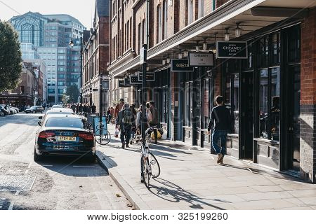 London, Uk - September 07, 2019: People Walking Past The Shops And Cafes In Spitalfields Market, One