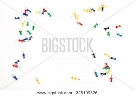Colorful Push Pins Isolated On White Background In The Form Of A Frame