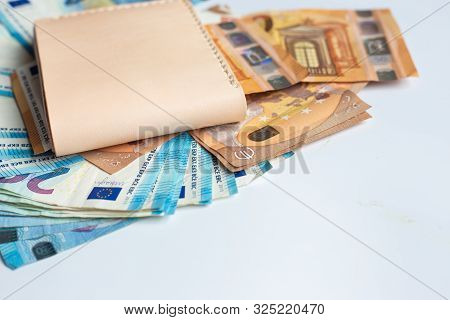 Leather Wallet With Euro Money Bill On White Background