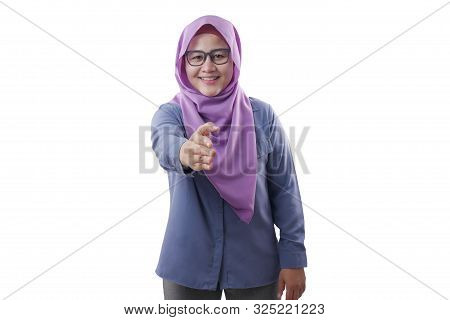 Portrait Of Muslim Businesswoman Offers Hand Shake, Deal Partnership Agreeement Concept, Selective F