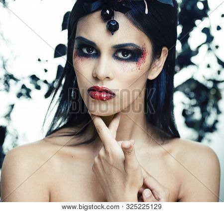 Pretty Brunette Woman With Rose Jewelry, Black And Red, Bright Make Up Kike A Vampire Closeup Red Li