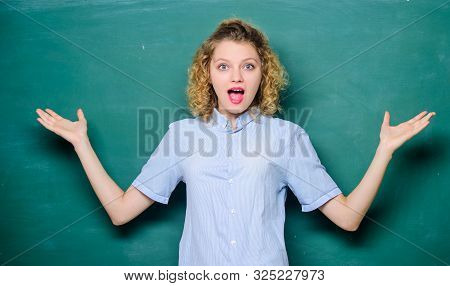 Woman Teacher In Front Of Chalkboard. Teacher Explain Hard Topic. Teacher Best Friend Of Learners. G