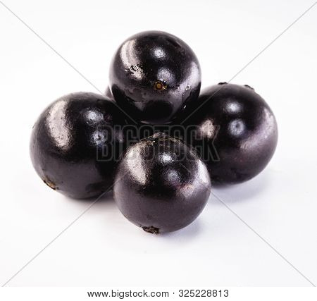 Brazilian Fruits Called Jabuticaba Or Jaboticaba. Isolated On White Background. Organic Fruit And No