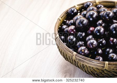 Fruit Called Jaboticaba Or Jabuticaba In A Basket On A White Background, Preserves Organic And Healt