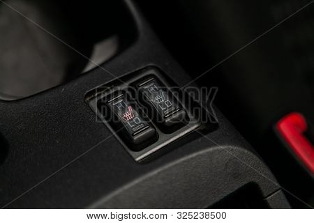 Novosibirsk, Russia - September 07, 2019:  Mitsubishi  Lanser, Close-up Of Black Of Seat Heating But