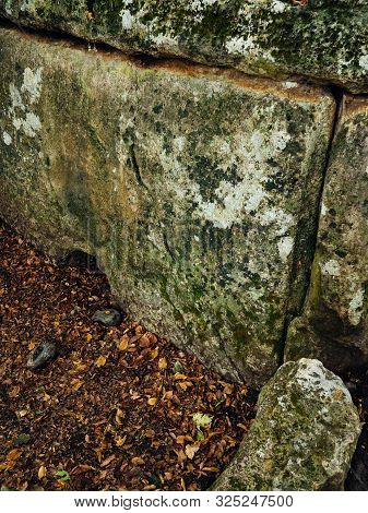 Stone Dolmens. Ancient Burial And Religious Buildings Of Stone Blocks. Autumn Forest