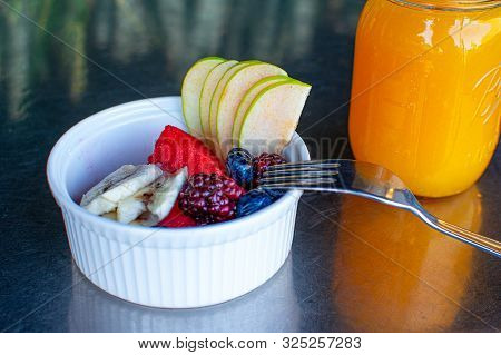 Delicious Red Fruits With Orange Juice