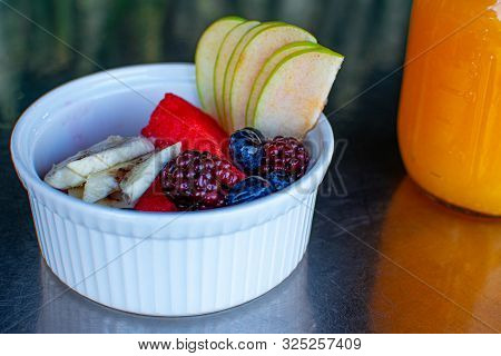 Delicious Red Fruits With Orange Juice