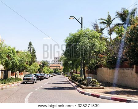 Holon, Israel  April 02, 2019: Private Houses, Trees And Streets In Holon, Israel.