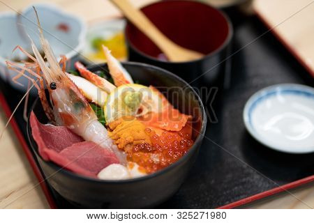 Kaisen Don (sashimi Seafood Rice Bowl) Served In A Black Bowl, Japanese Food.