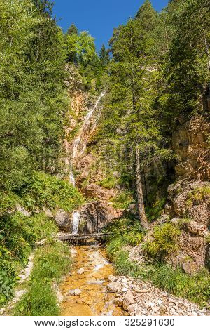 View At The Waterfall In Canazei, Italy