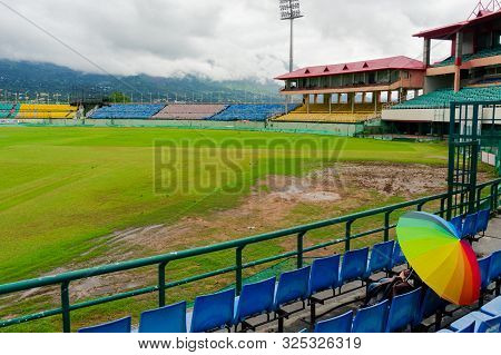 Colorful Umbrella On The Seats Of Dharamshala Himachal Cricket Stadium