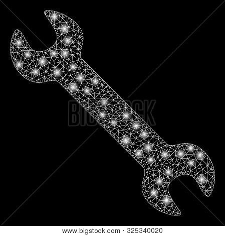 Glossy Mesh Wrench With Sparkle Effect. Abstract Illuminated Model Of Wrench Icon. Shiny Wire Frame 
