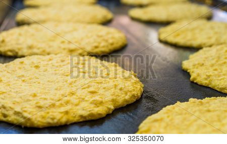 Traditional Venezuelan Dish Cachapa Cooking At A Street Food Market.