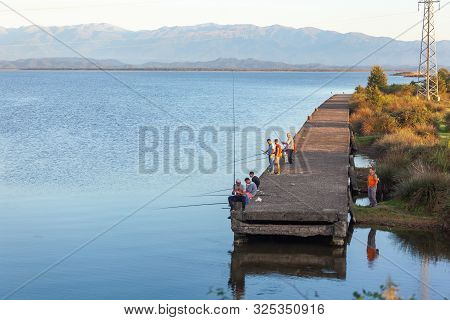Poti, Georgia - 01.09.2019: Fishermen On Lake Paliastomi.